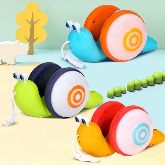 Caracol de estimação, Brinquedo interativo, Brinquedo educativo, Caracol de corda, Luzes cintilantes, Diversão infantil, Brinquedo animado, Companheiro de brincadeira, Estímulo criativo, Exploração divertida, Brinquedo luminoso, Movimento e luzes, Aprendizado brincando, Caracol de brinquedo, Brinquedo puxado por corda, Brincadeira mágica, Estimulação sensorial